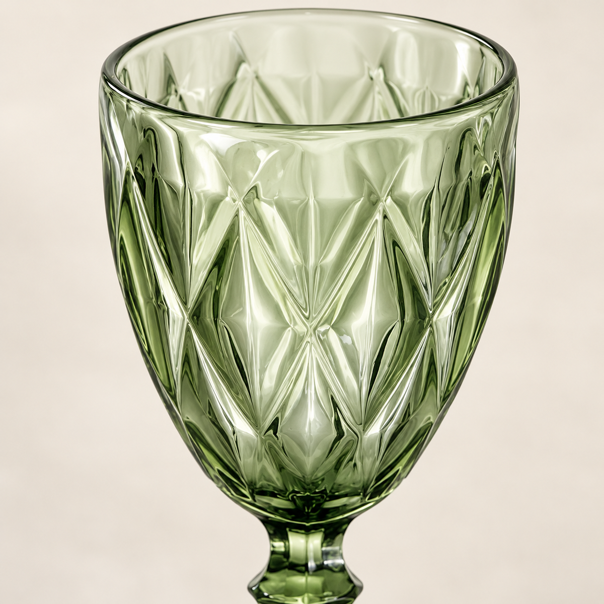 Green embossed glass goblets: detail