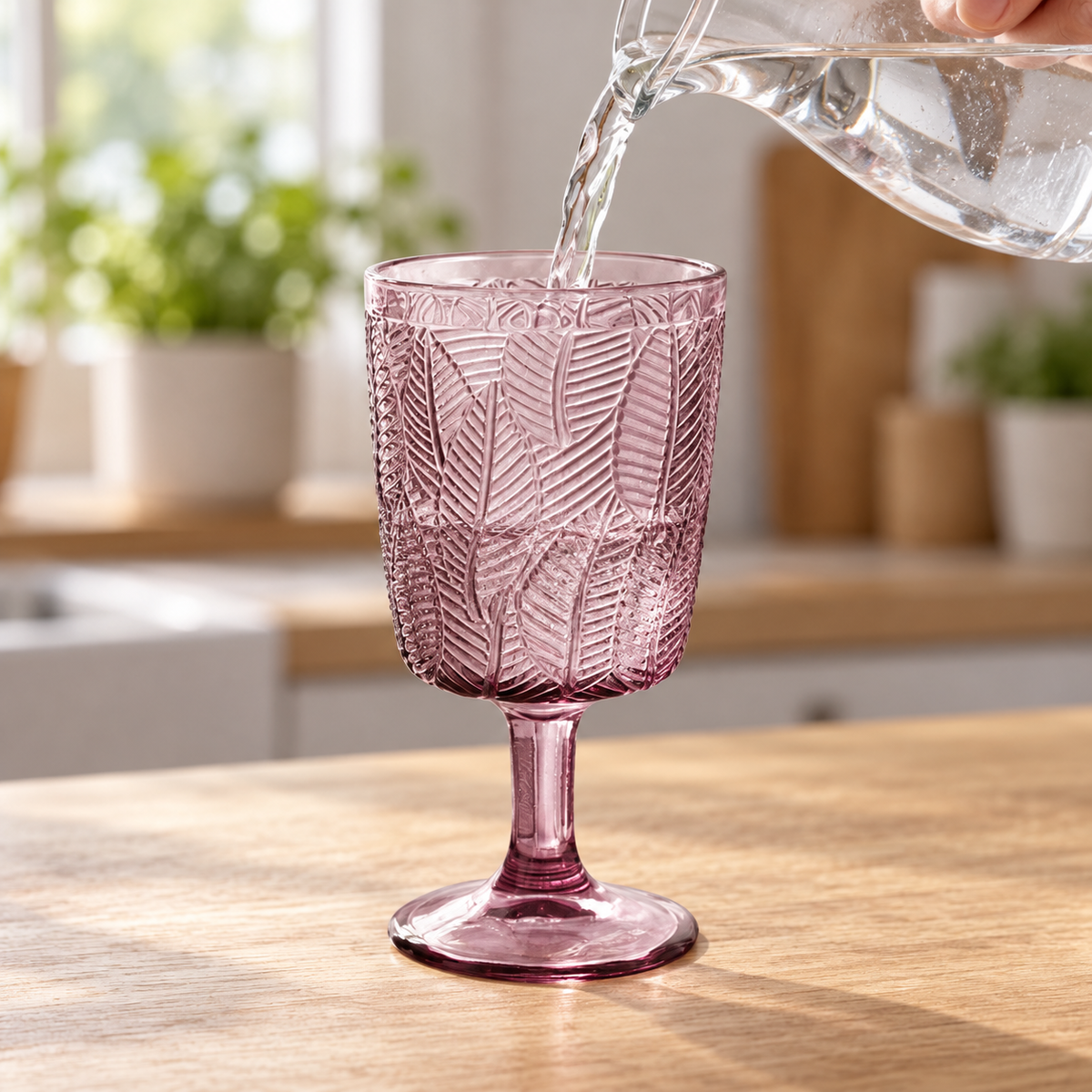 Purple leaf-embossed goblets: pouring