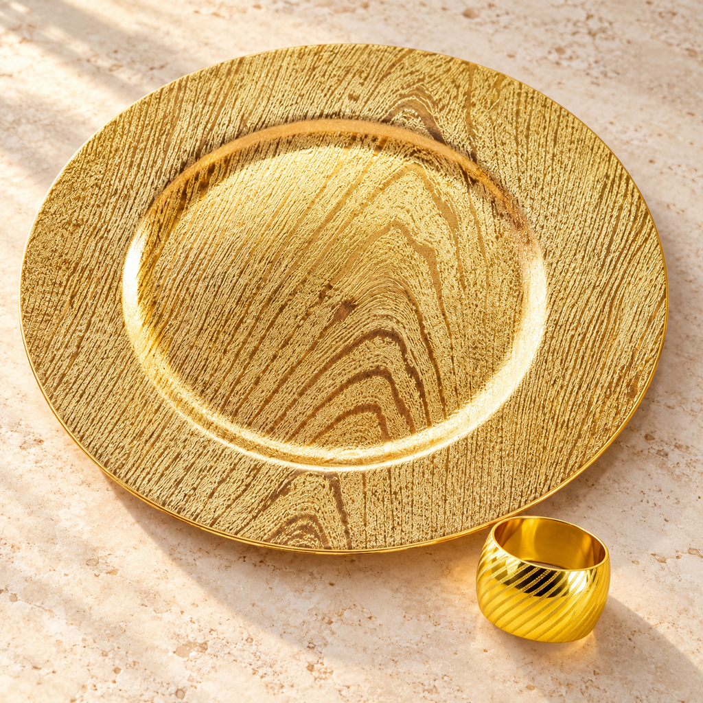 Visible gold woodgrain charger face and diagonal-texture napkin ring in a new tabletop detail arrangement; representative pieces from the set.