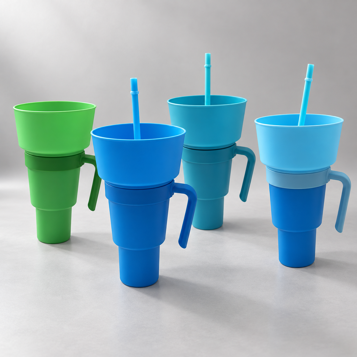 Solid Blue, Green Solid, Turquoise Blue and Two Tone color alternatives showing open-ended handles and stepped cup bodies. One selected cup configuration supplied.
