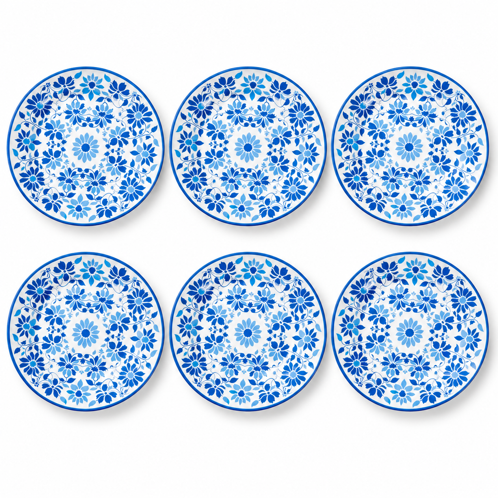 Six indigo blue floral melamine plates on white