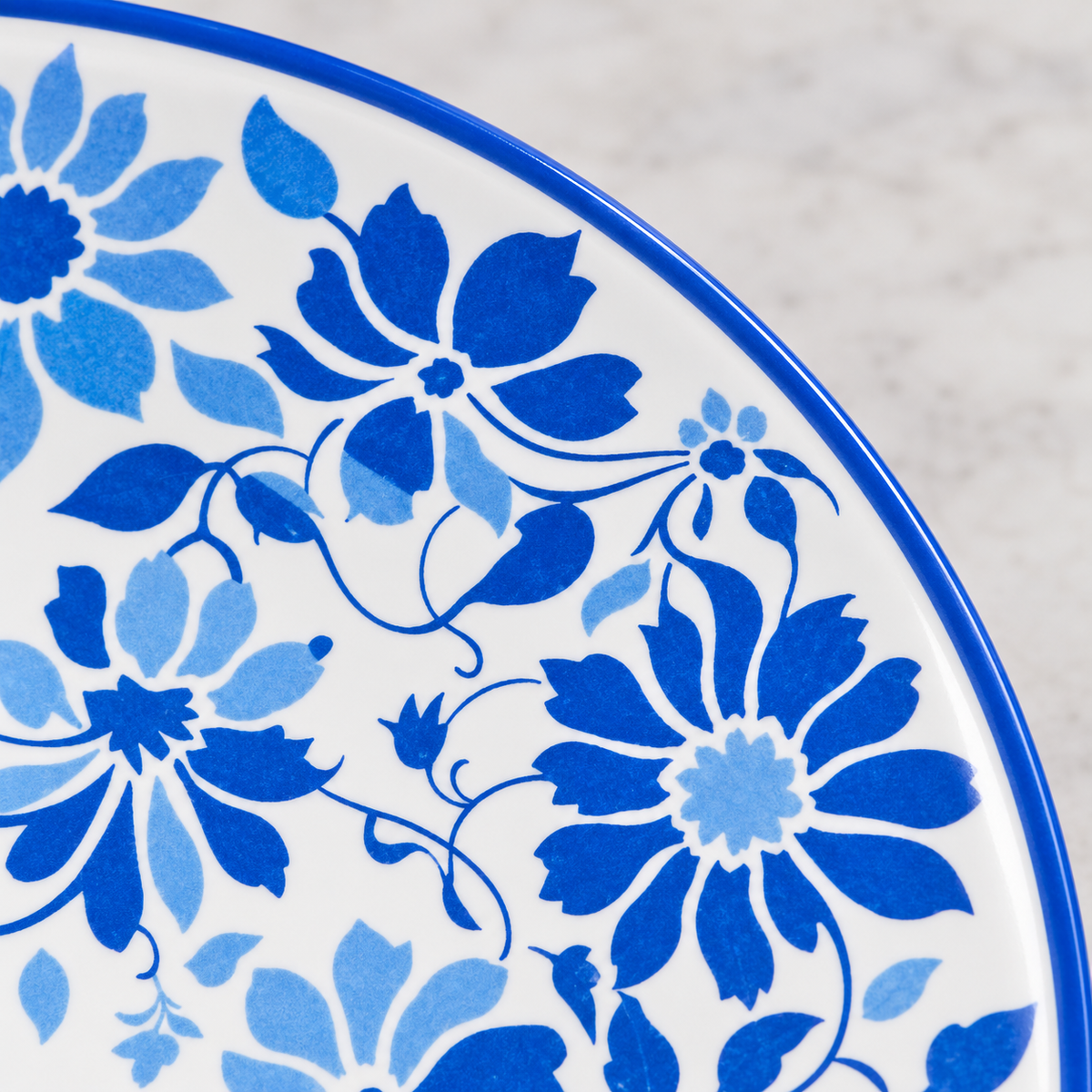 Close detail of blue floral print and rim