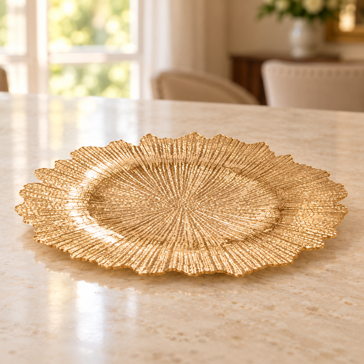 Low angled profile of gold glass charger
