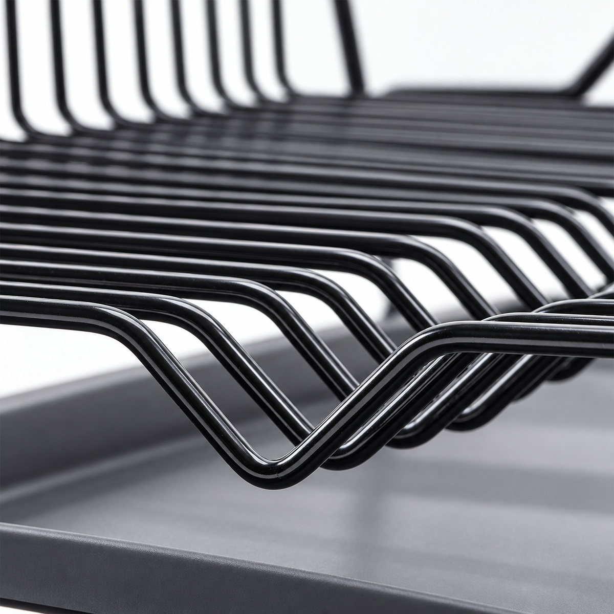 Black wire dish drying rack with matching drip tray; dishes and props not included