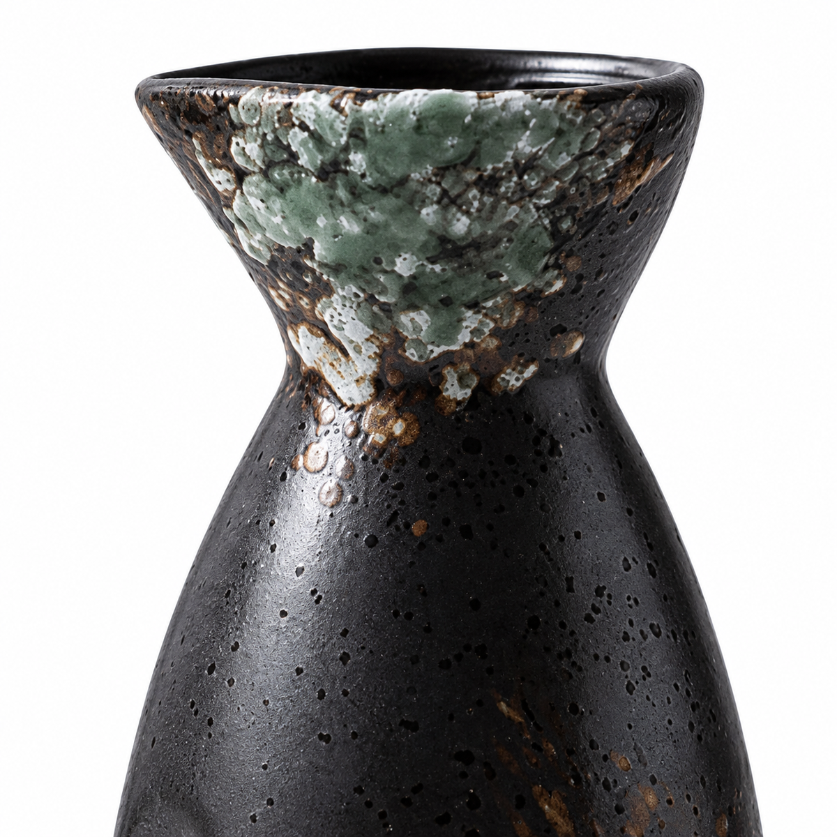 Ceramic sake bottle lip and textured spring green glaze detail