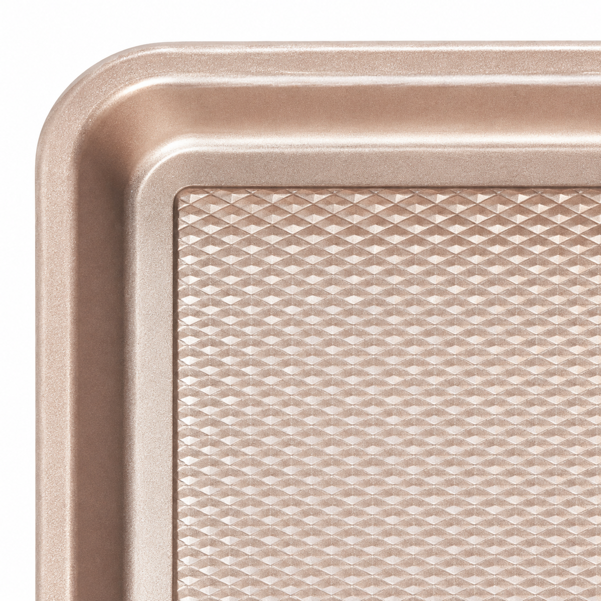 Gold baking pan rounded rim and diamond-pattern detail