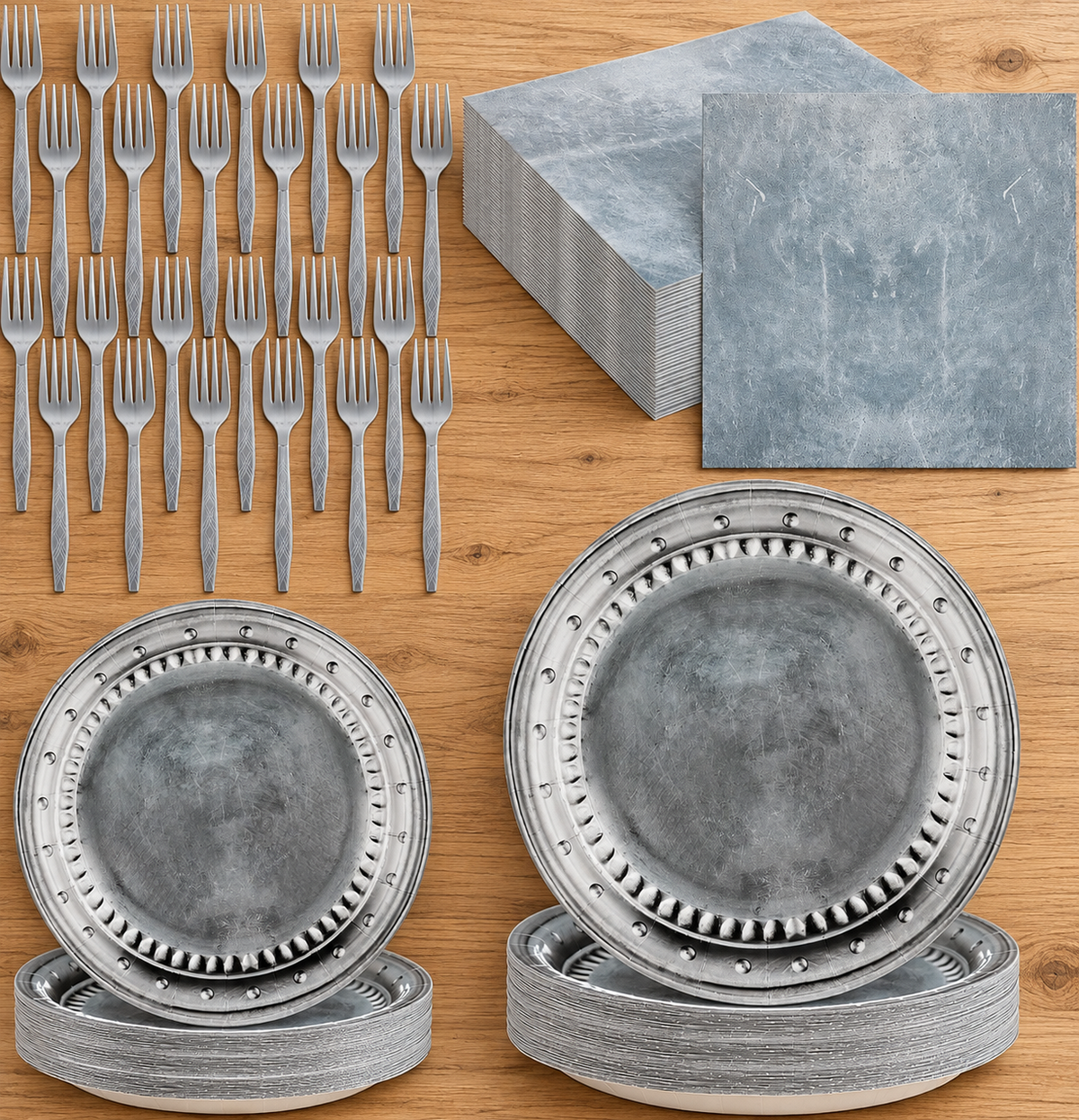 Gray marbled party plates, napkins and plastic forks displayed on a table