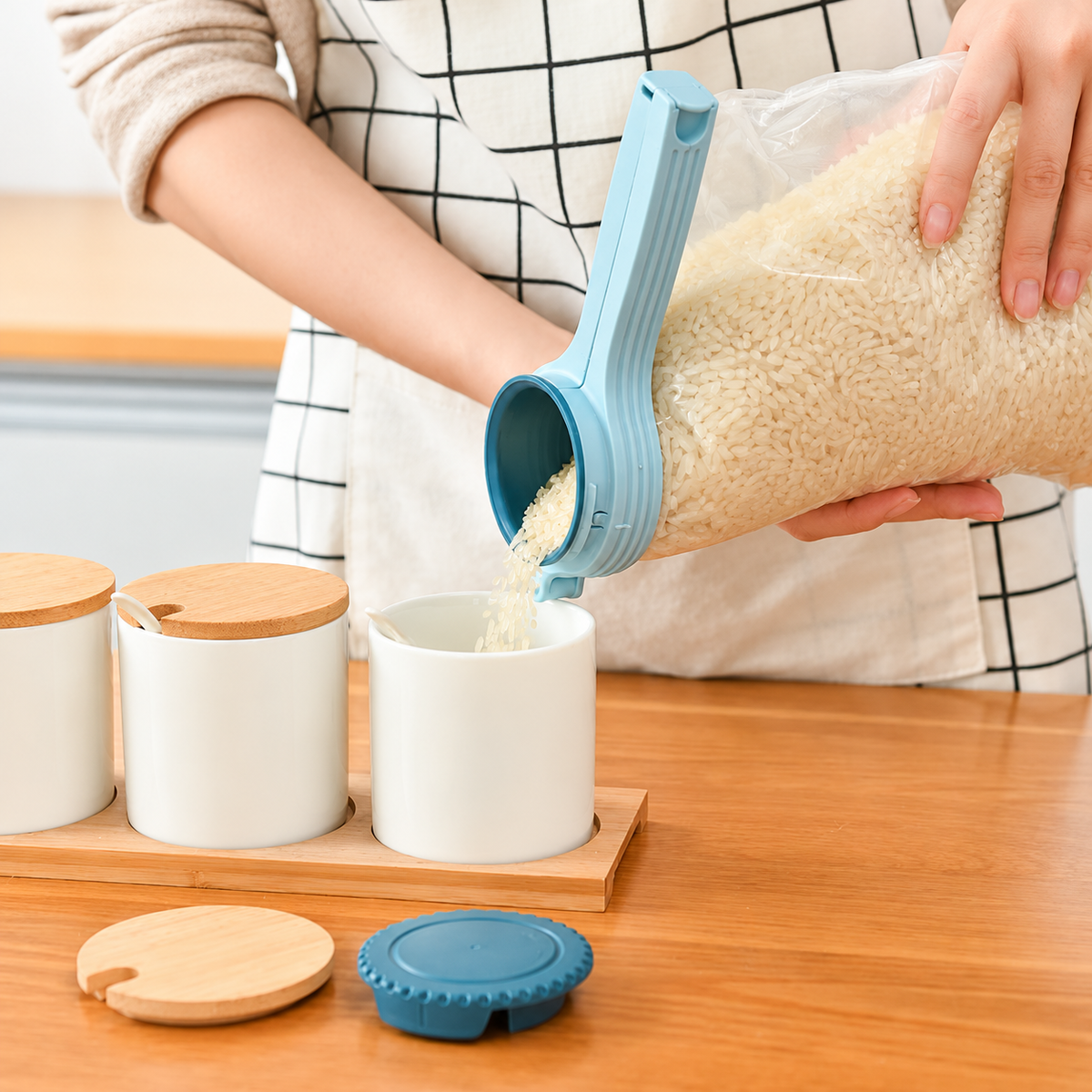 Blue bag spout pouring rice into a canister