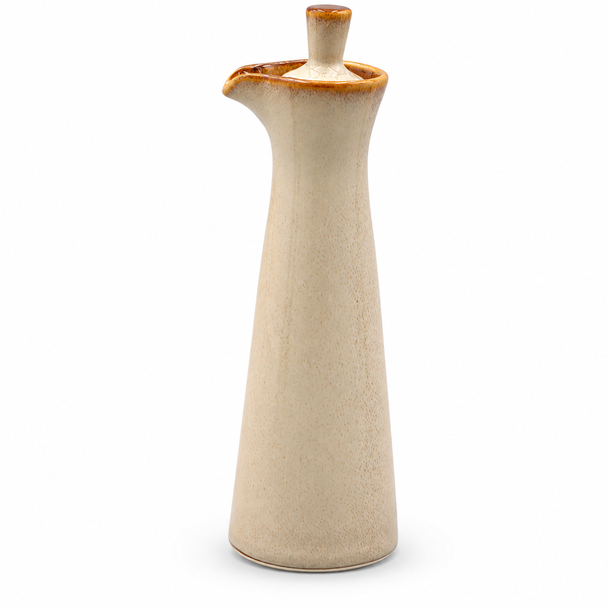 Cream and brown glaze condiment bottle on white