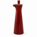 Red glaze condiment bottle on white