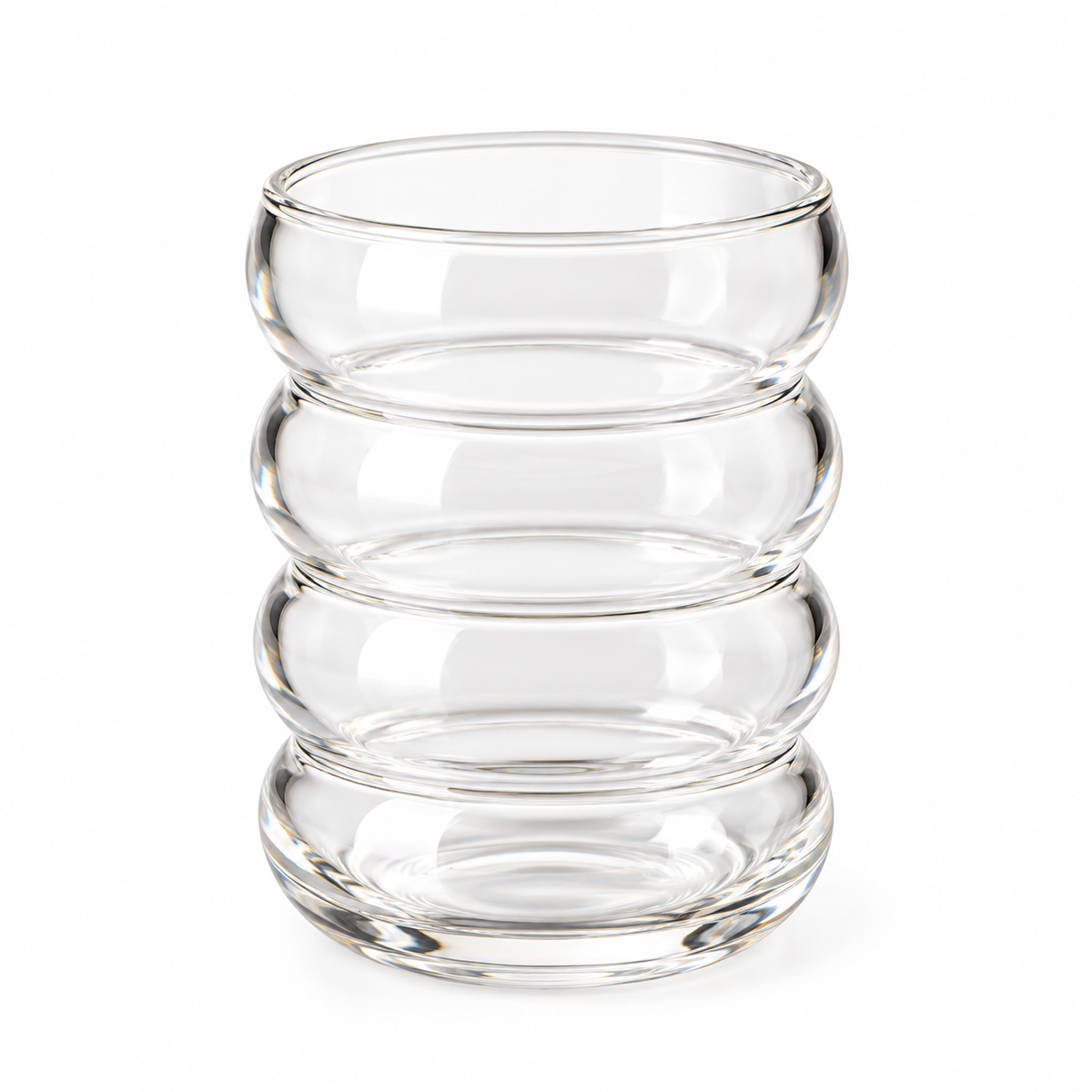 Clear four-wave glass cup on white