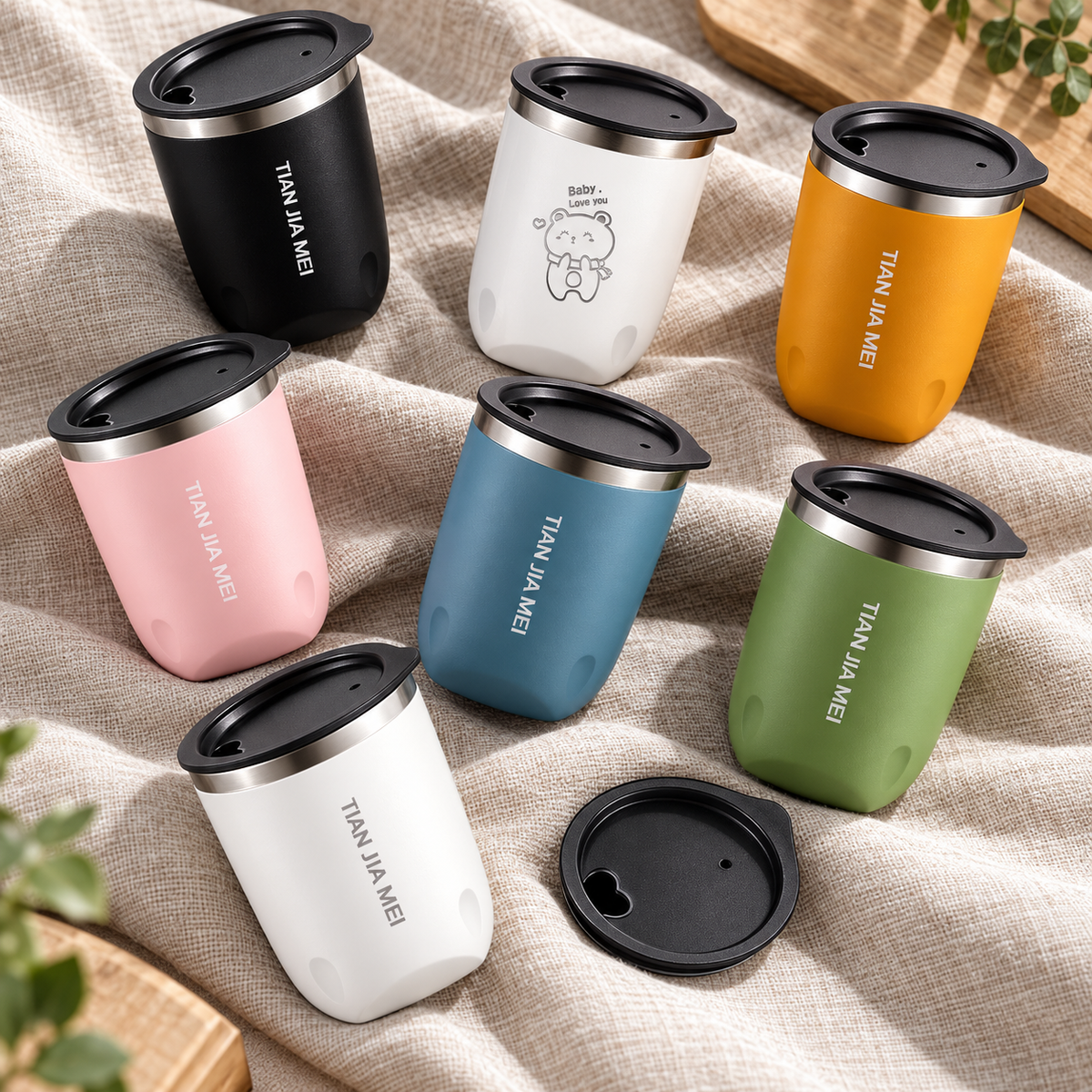 Close view of tumbler finishes, sip lids and silver rims