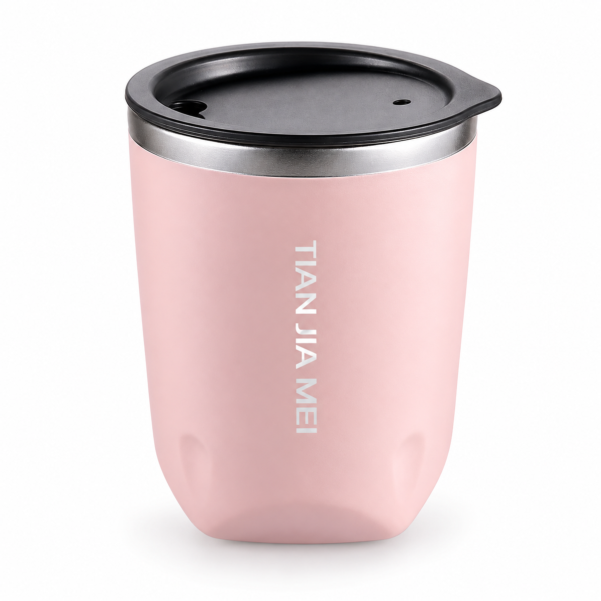 Double-wall tumbler with lid, pink finish, on white