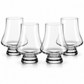 Set of four smooth clear 250 ml whiskey tasting glasses on white