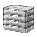 Gray four-tier dumpling freezer box on white background