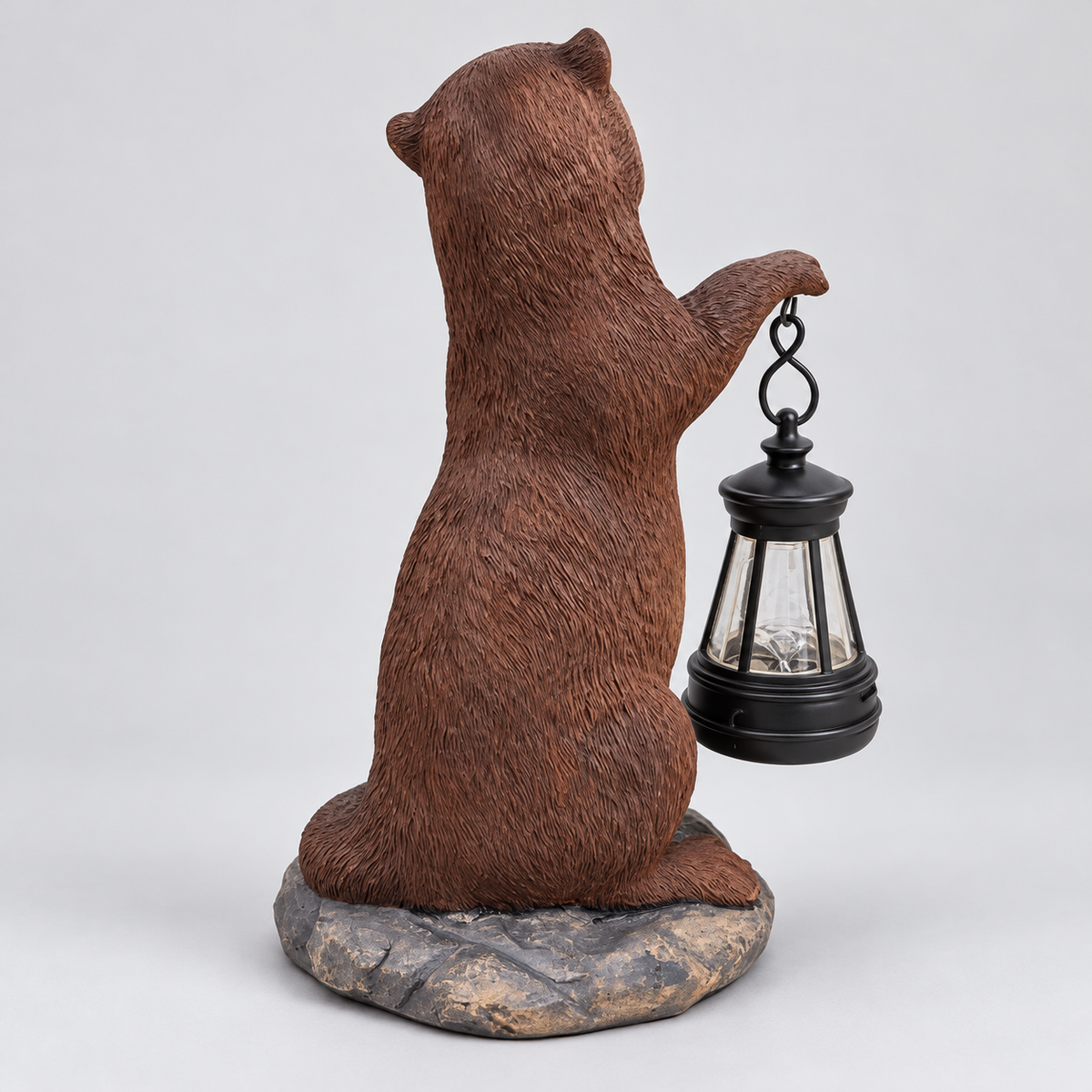 Rear view of the otter statue and unlit hanging lantern