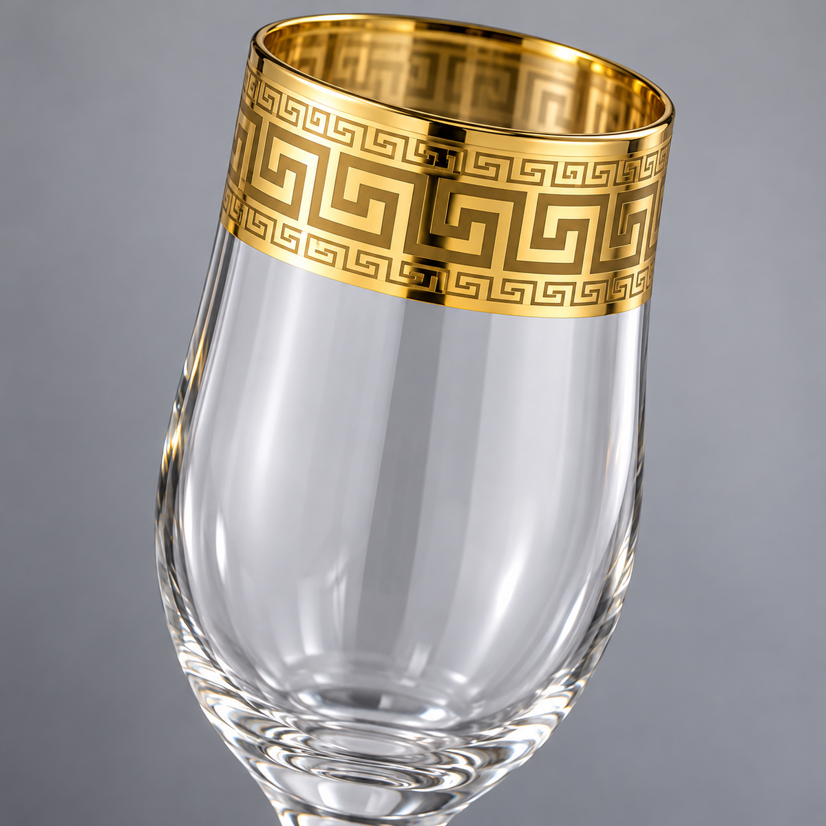 Gold Greek key champagne flutes: detail view