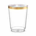 Clear gold-rim party cup on a white background.