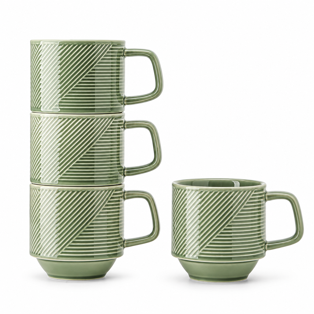 Four pea-green ceramic mugs with diagonal and horizontal relief, three stacked and one beside them on white.