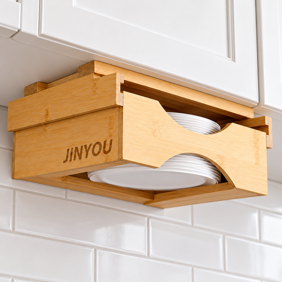 Low-angle view of under-cabinet bamboo paper plate dispenser; paper plates not included