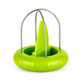 Green kiwi peeler and stored serrated insert on white background