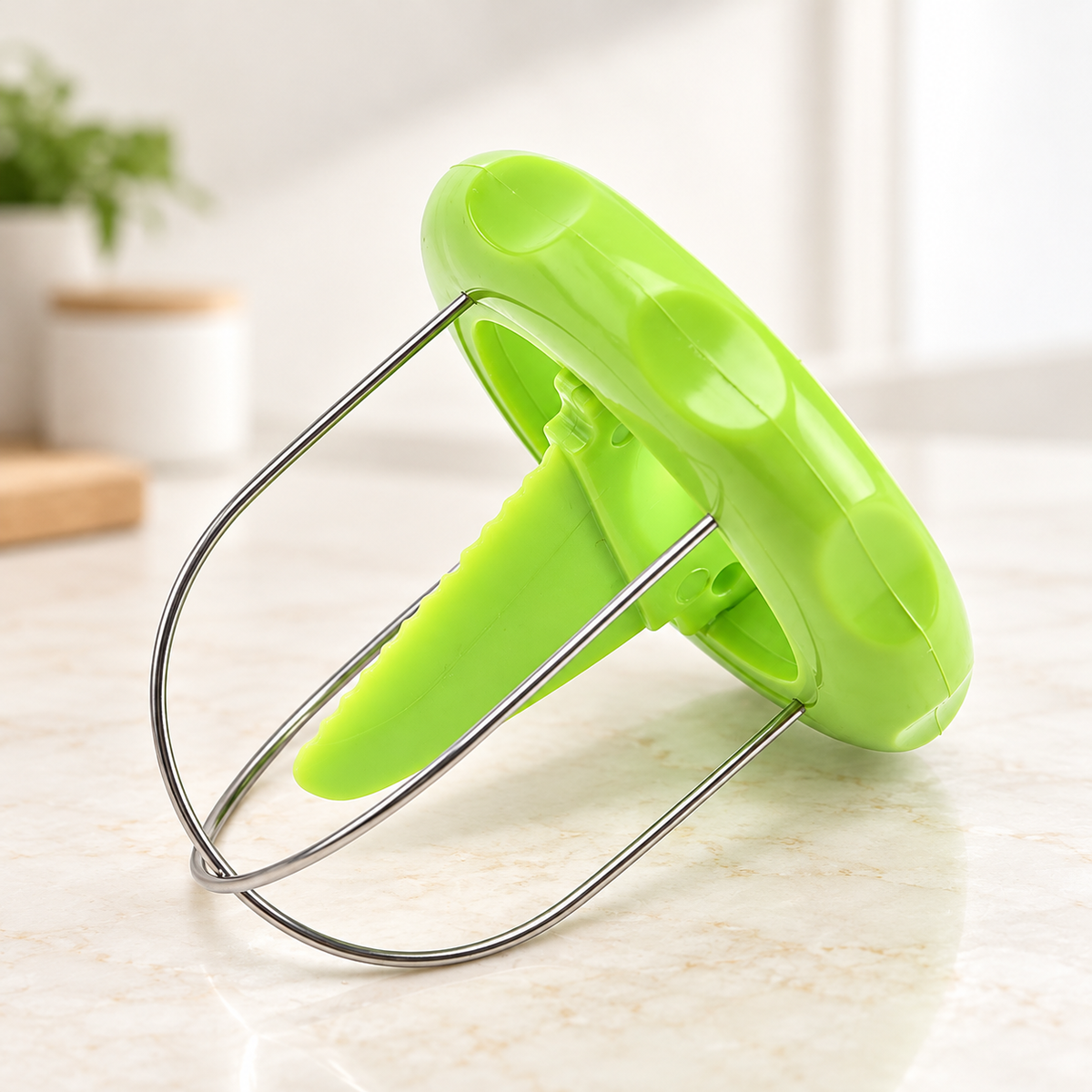 Side view of green kiwi tool with stored insert and crossed wires