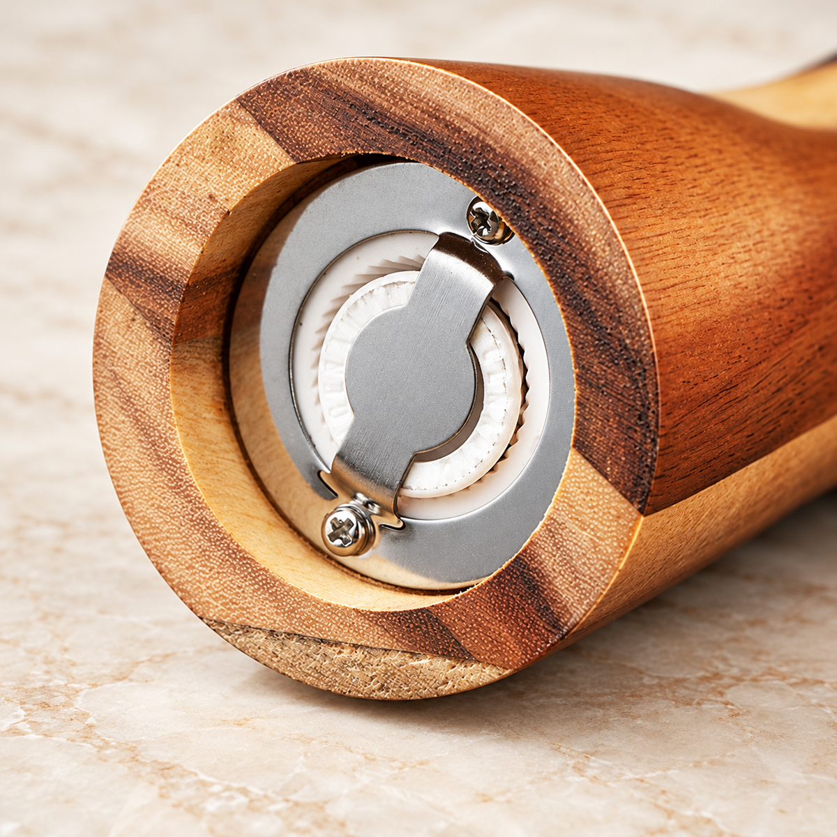 Close-up of actual ceramic grinding mechanism and metal retaining plate