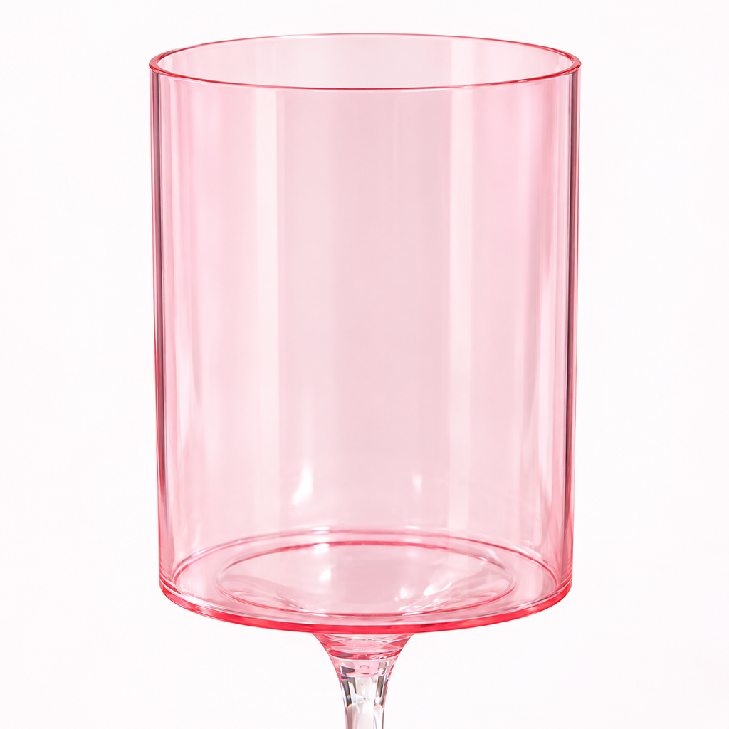 Close-up of the pink goblet bowl and thin rim, showing its translucent cylindrical shape.