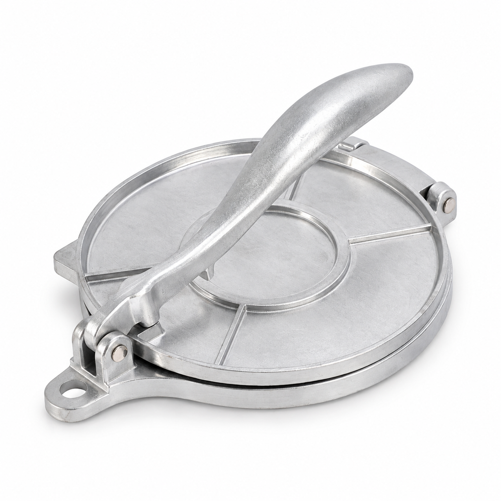 Silver aluminum tortilla press with closed round plates and lever handle on white