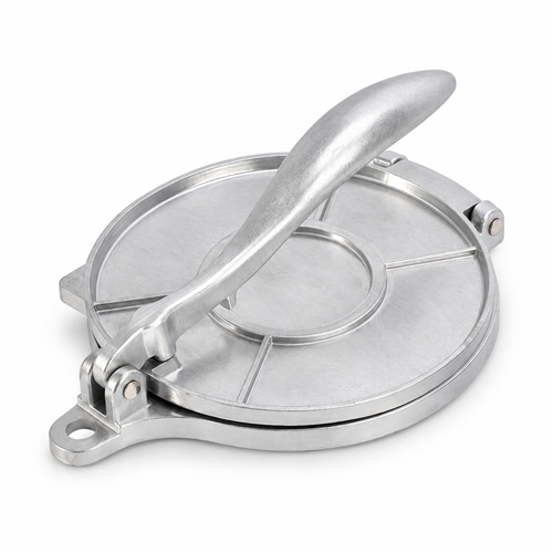 Silver aluminum tortilla press with closed round plates and lever handle on white