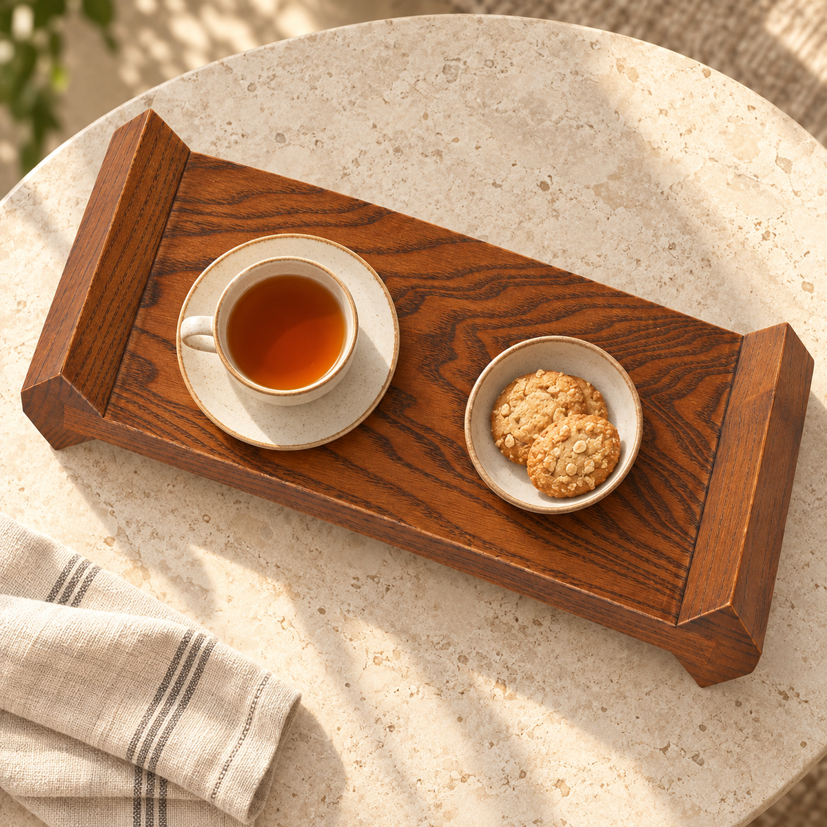 Wooden display riser used for tea and cookies, overhead view; tableware and food not included