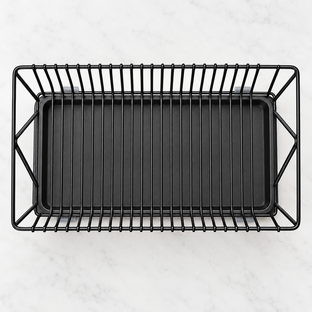 Overhead view of the empty black wire dish rack and drip tray