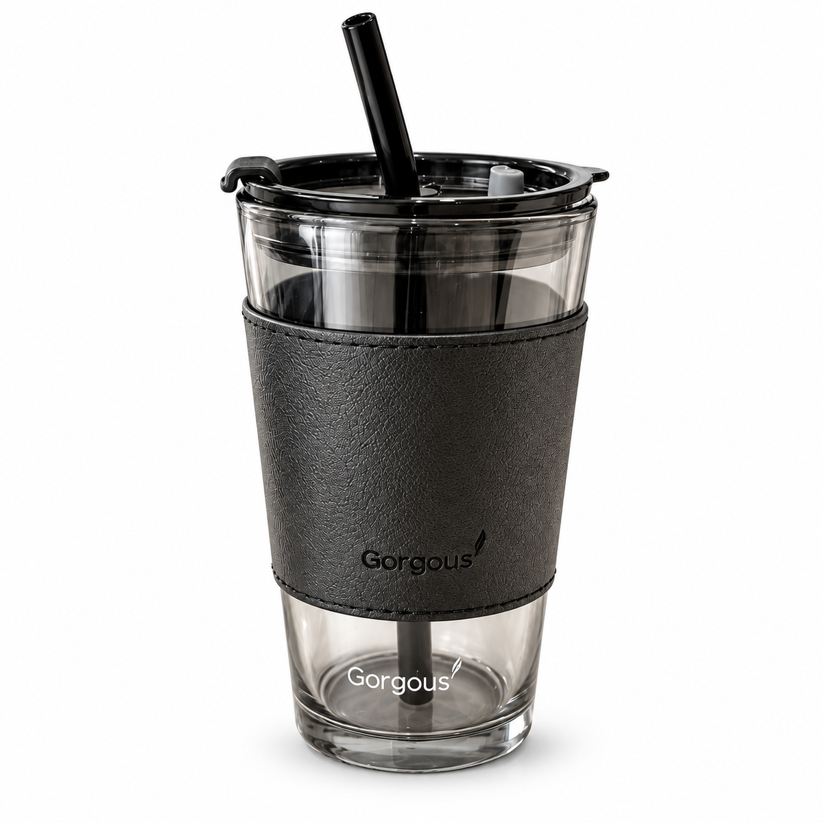 One 450 ml smoky glass cup with black sleeve, lid and black straw, isolated on white.
