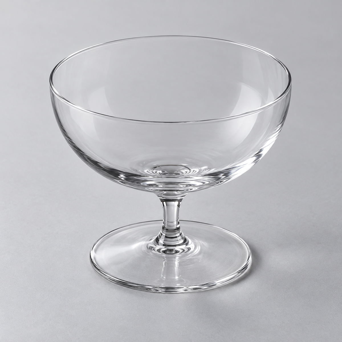 Clear short-stem crystal coupe showing bowl, rim and circular foot