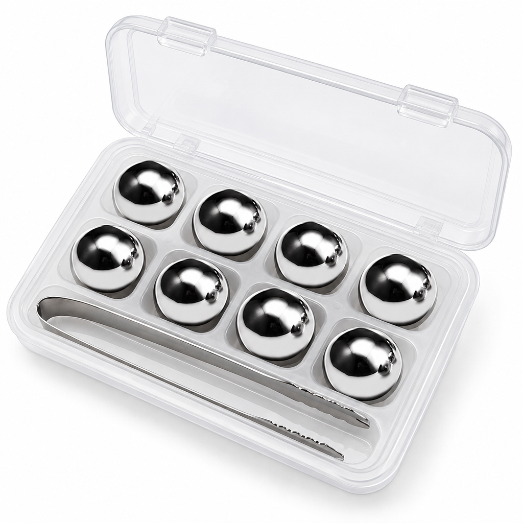 Circular eight-piece whiskey cooling set in its clear storage box with tongs on white.