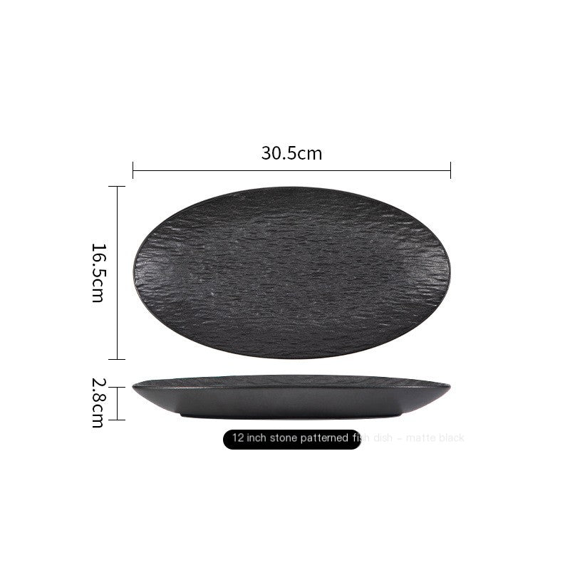 Matte black textured oval plate with supplier dimensions 30.5 x 16.5 x 2.8 cm