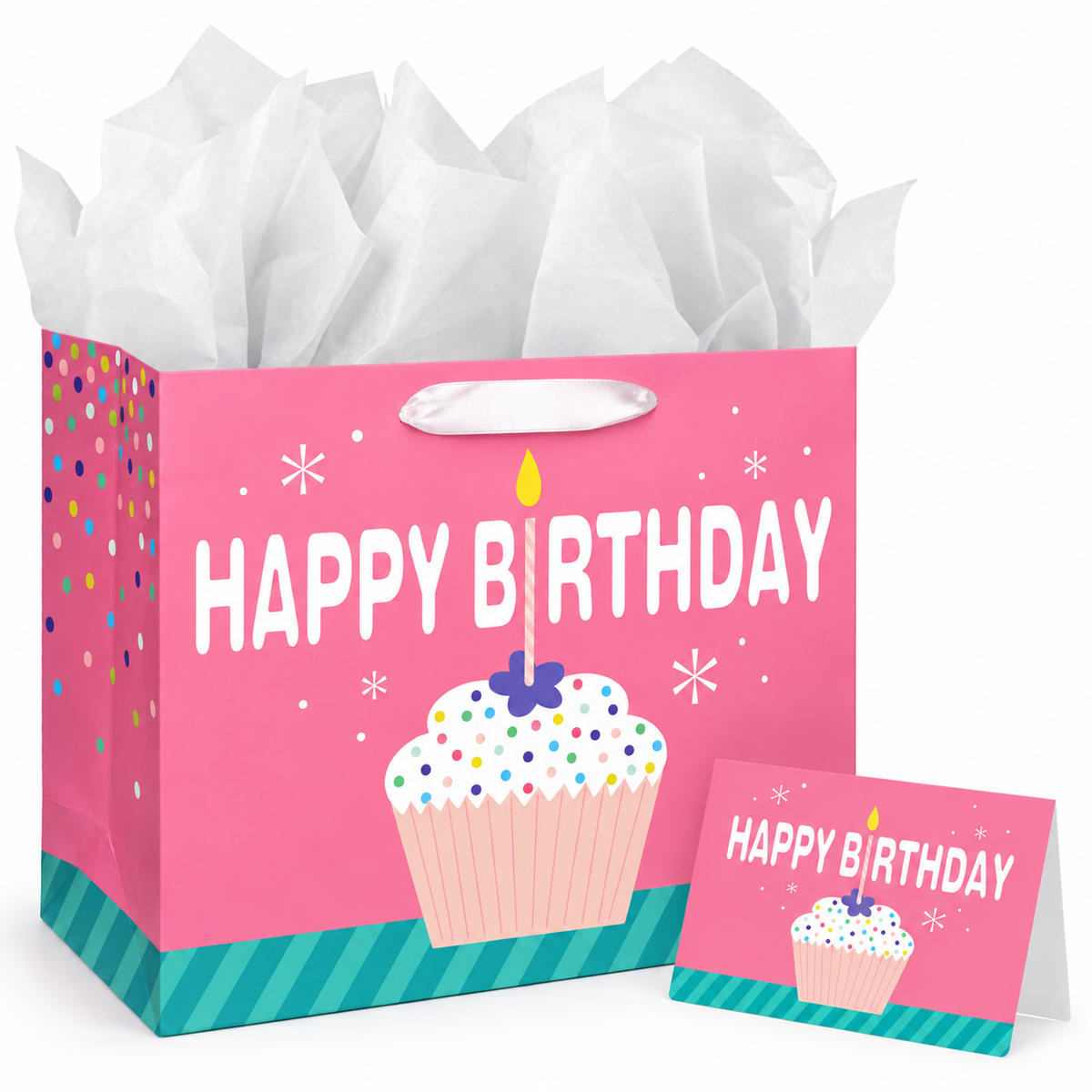Pink cupcake Happy Birthday paper gift bag: white studio with matching card; background objects are styling props