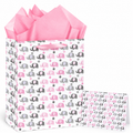 Pink and gray elephant paper gift bag with pink tissue and matching card on white background