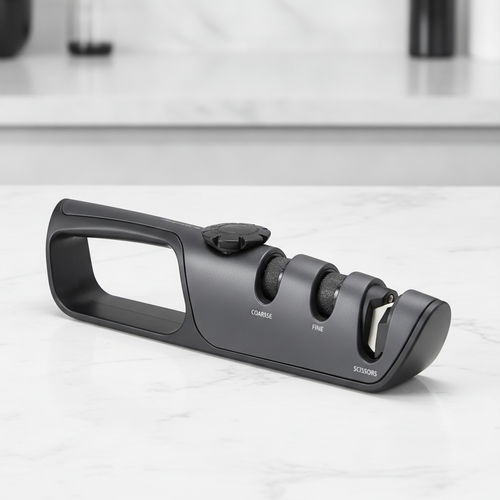 Matte-black multi-stage knife sharpener with comfort-grip handle - clean studio shot on kitchen counter