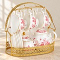 Red floral tea set with gold storage stand