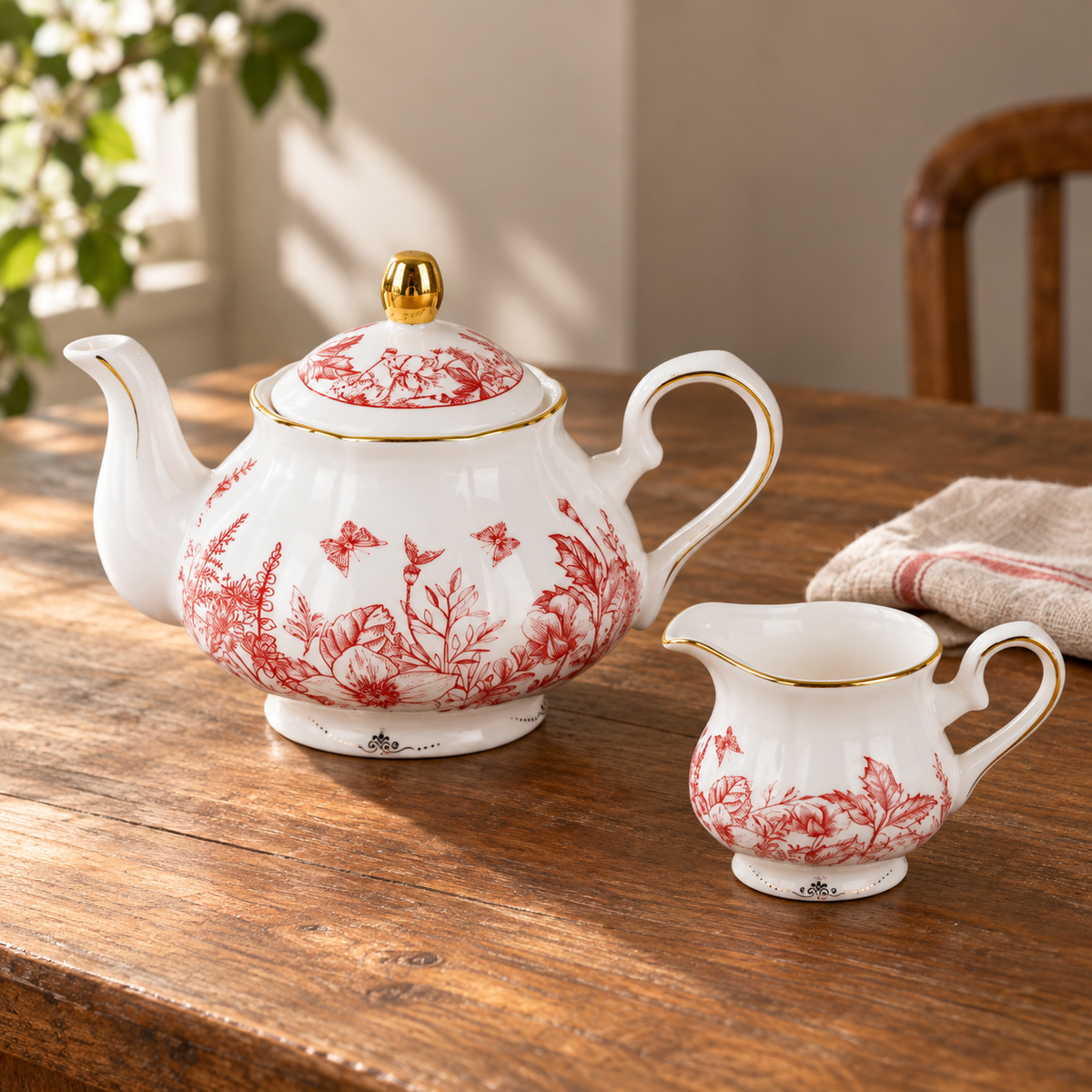 Red floral teapot and small creamer
