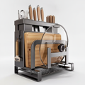 Black metal kitchen countertop organizer rack studio hero on a seamless light background, loaded with knives, cutlery, chopstick cup, cutting boards, glass pot lid, peeler and drain tray