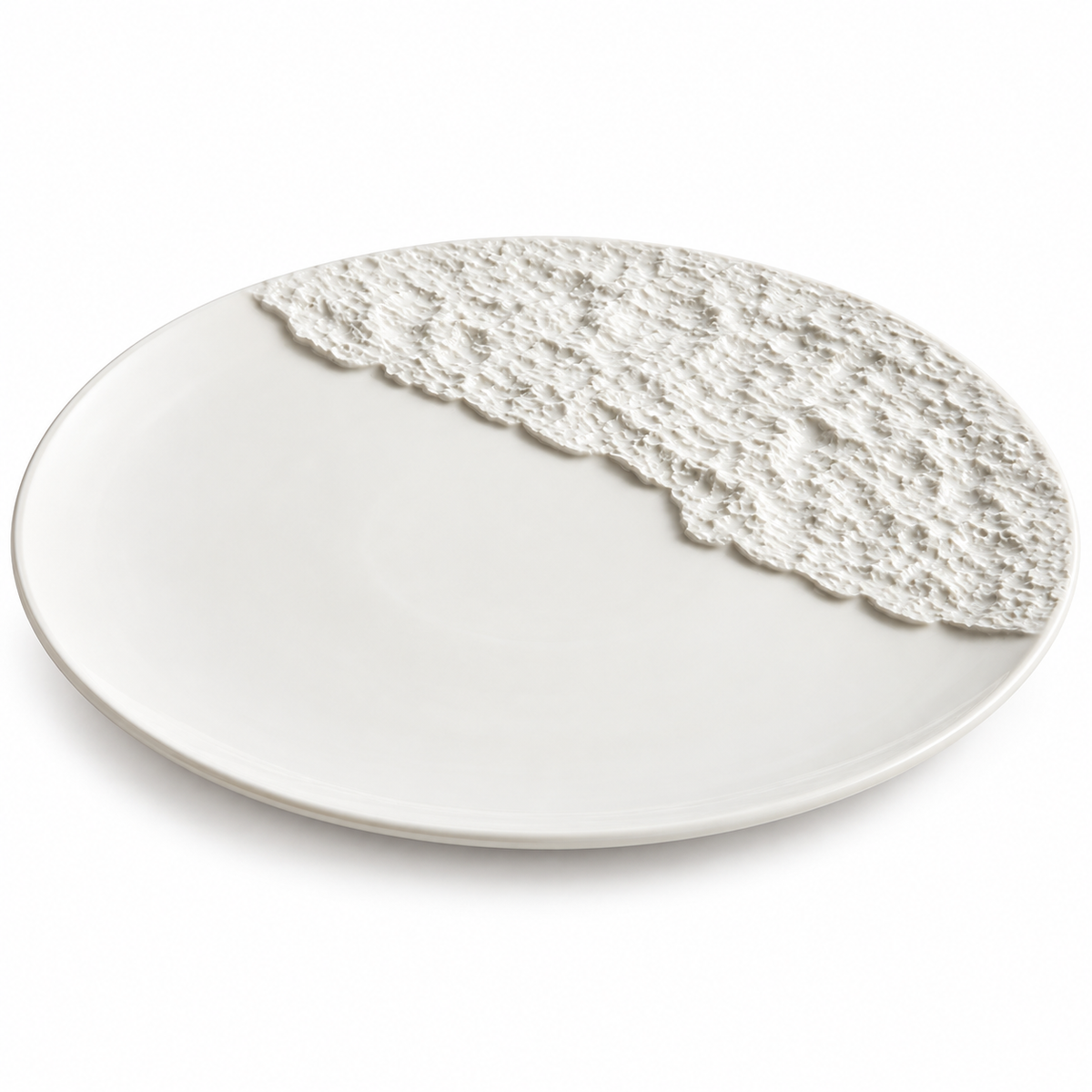 White rock-pattern porcelain plate on a pure white background
