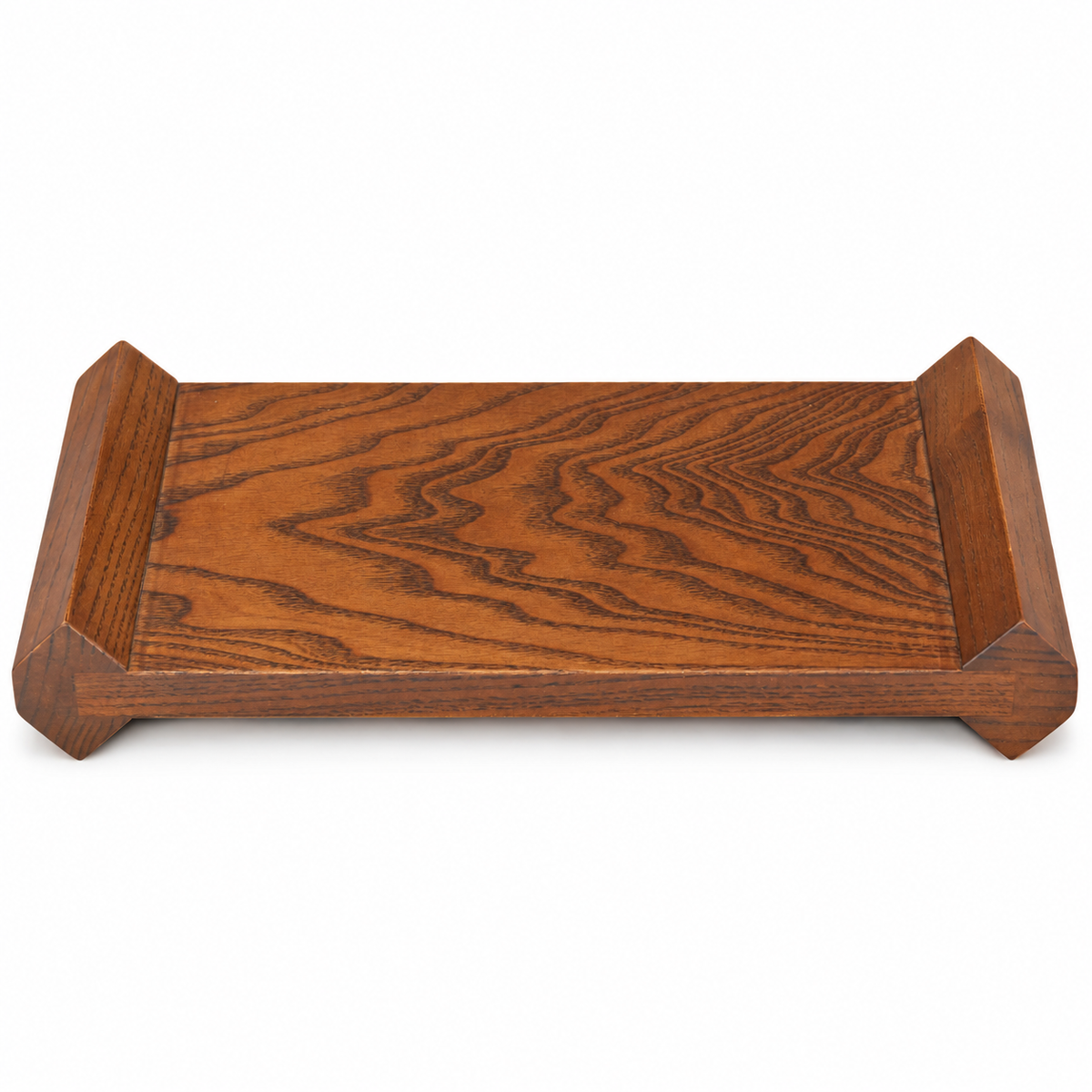 Brown wooden display riser with faceted raised ends on a white background